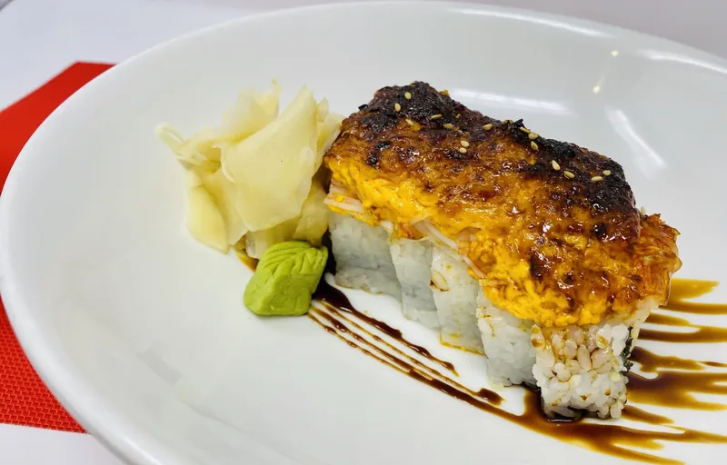 Baked sushi roll with spicy aioli and sweet soy